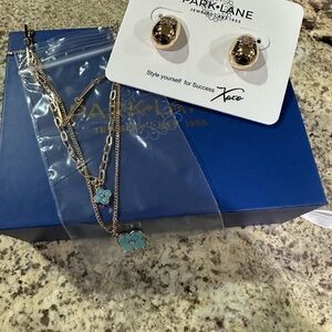 Park Lane June Sparkle Box: Gold Teardrop Earrings & 3-in-1 necklace.